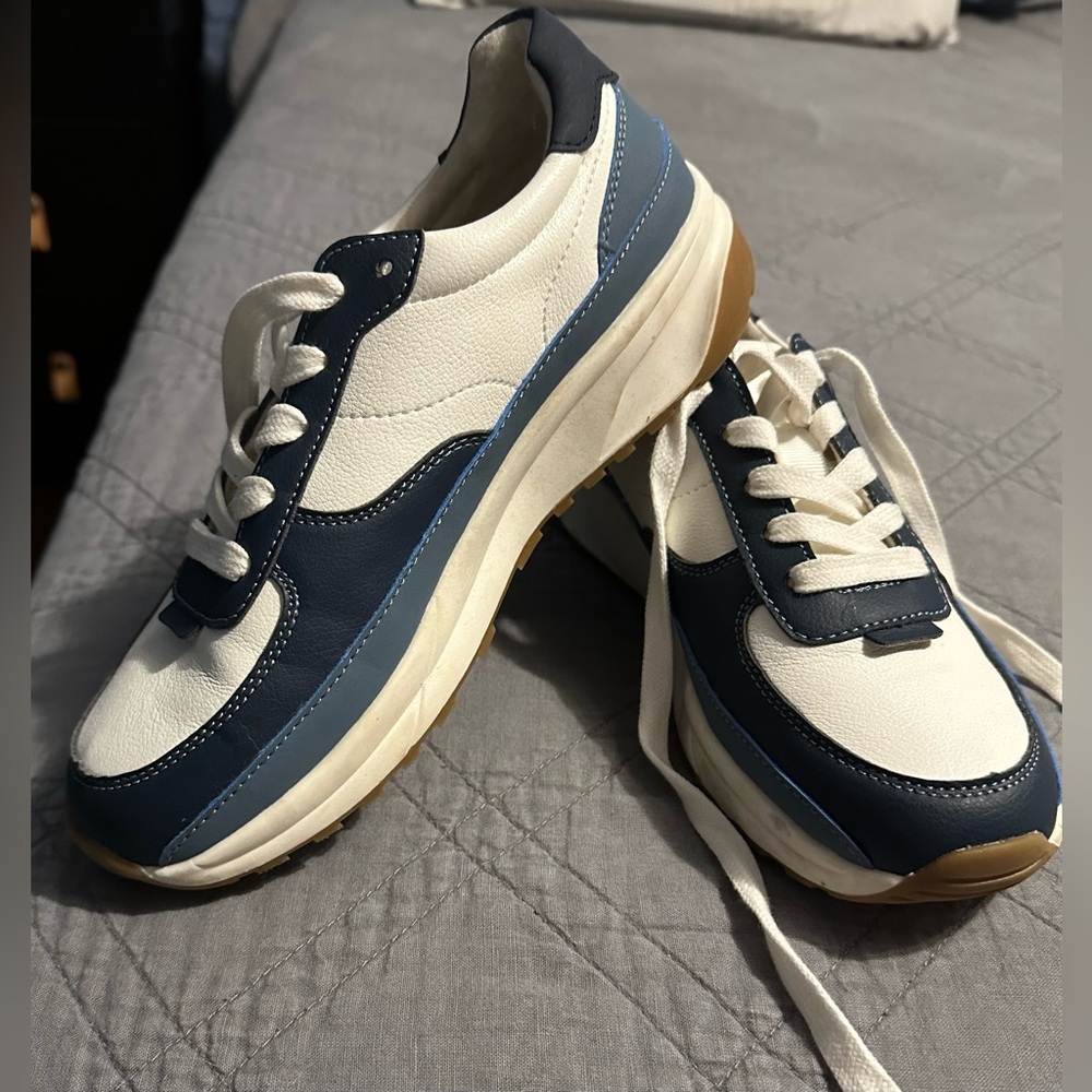 Blue and white sneakers